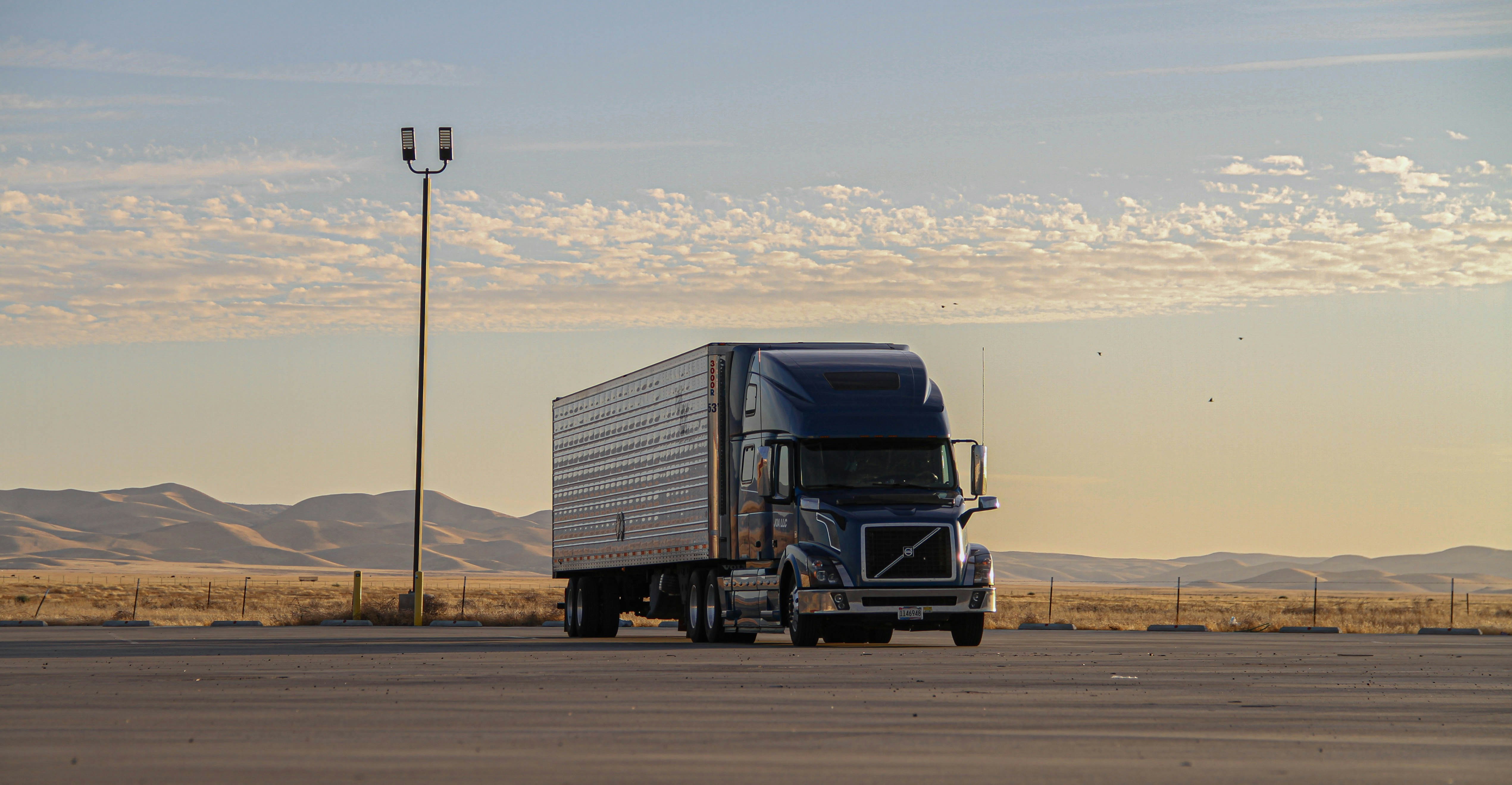 A trailer truck in a parking lot